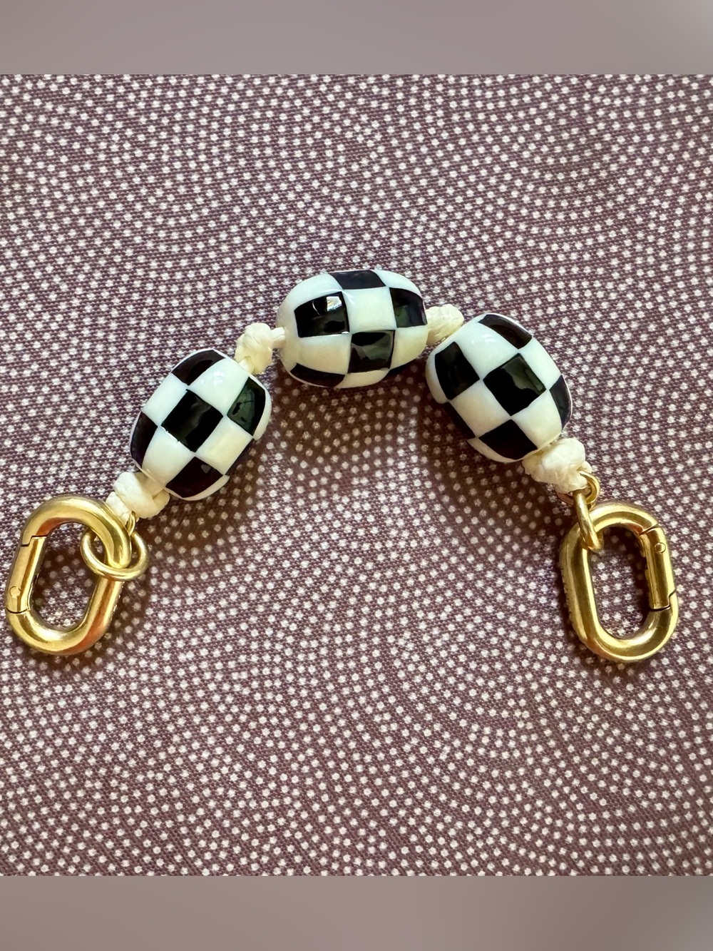 Clare V - black and white checkered top handle.